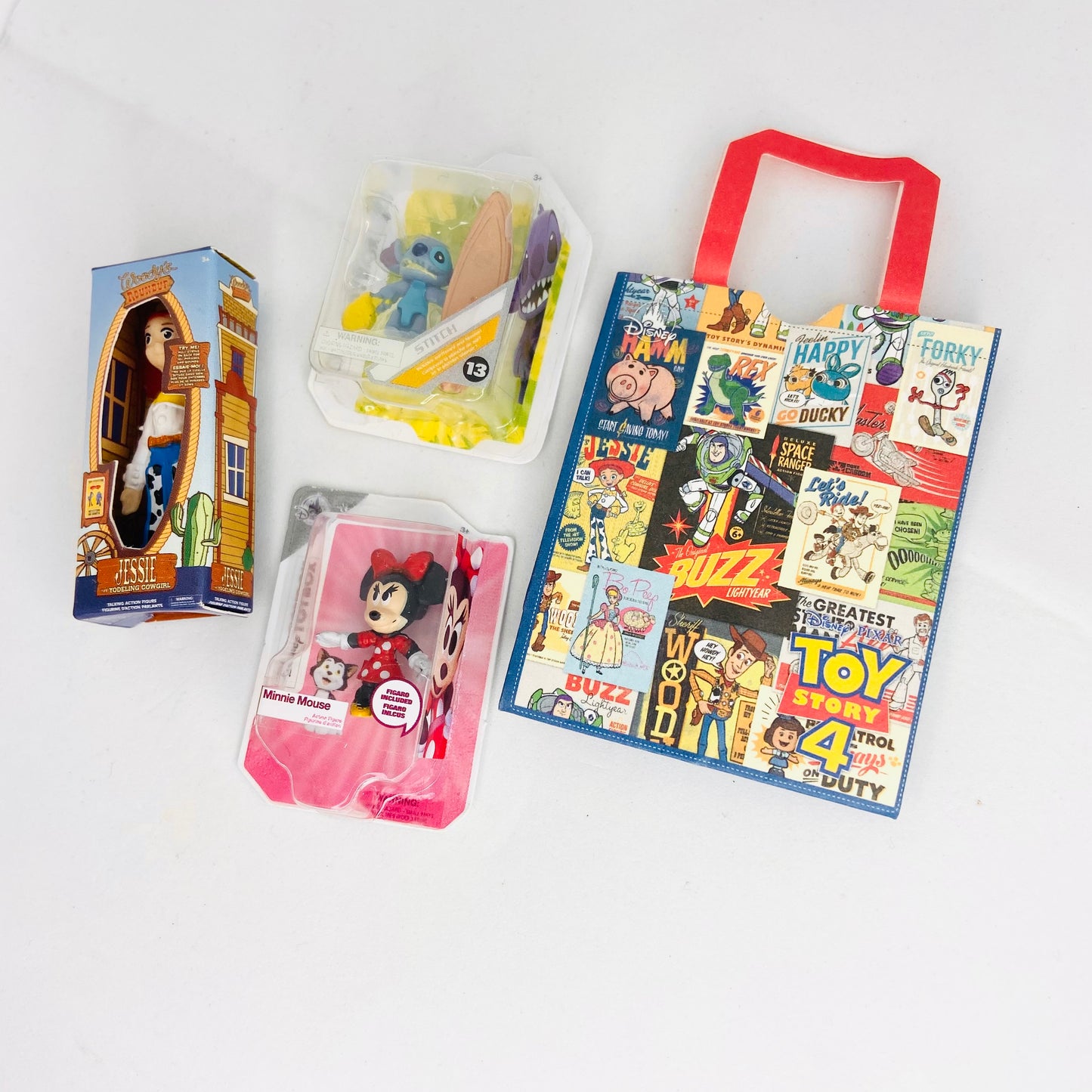 ZURU Mini Brands Disney Store Toys x4 Bundle (14 Jessie, 25 Stitch, 28 Minnie Mouse, 53 Gift Bag)