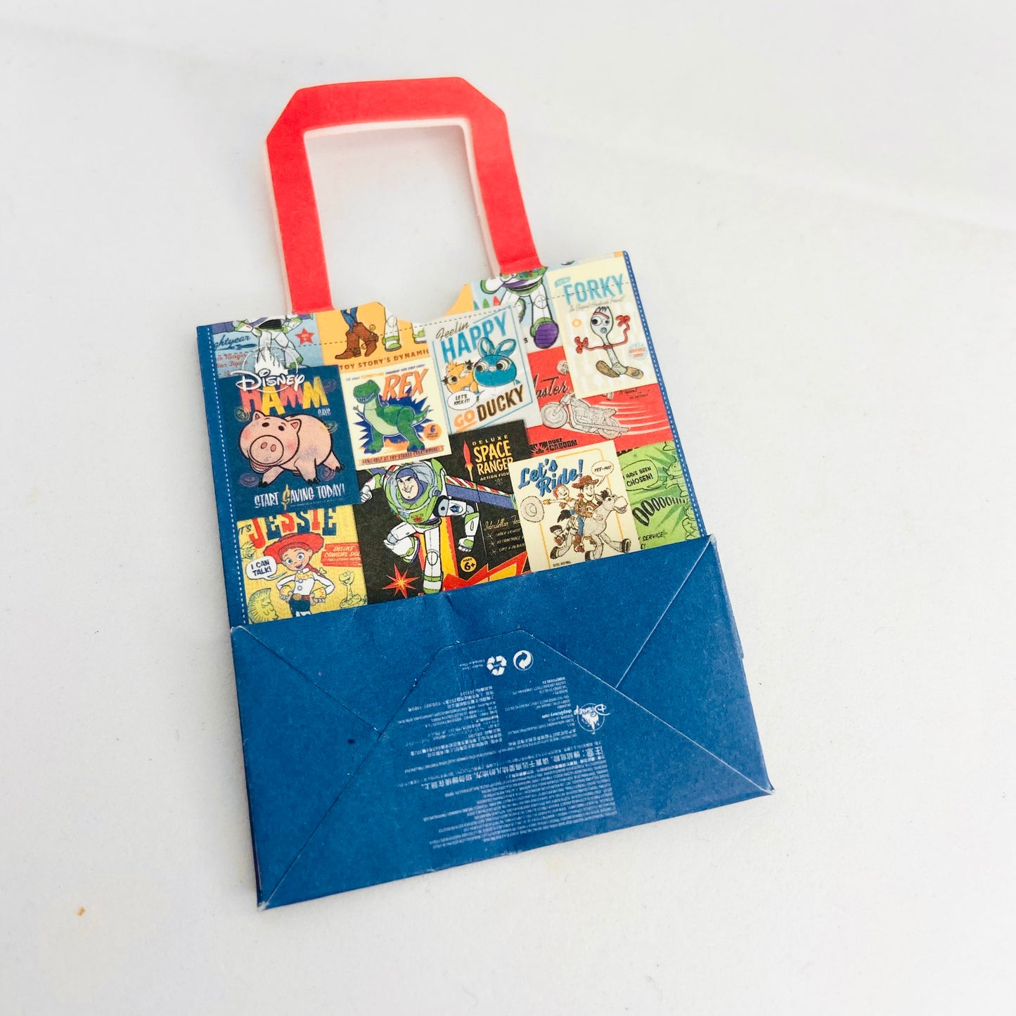 ZURU Mini Brands Disney Store Toys x4 Bundle (14 Jessie, 25 Stitch, 28 Minnie Mouse, 53 Gift Bag)