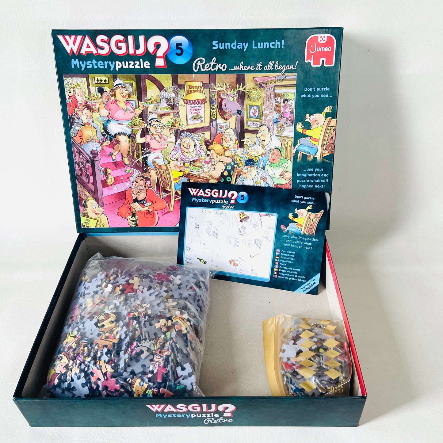 Jumbo WASGIJ | No.5 Mystery | Sunday Lunch | 1000 Piece Jigsaw Puzzle | 100% Complete