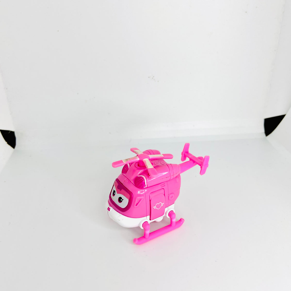 Super Wings | Dizzy | Pink | Mini Transform-a-Bot | Rescue Helicopter Figure